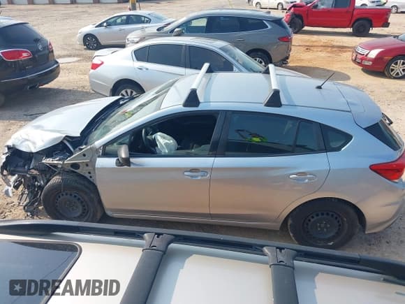 ✅ 2017 Subaru Impreza • VIN: 4S3GTAA63H1734443 • Lot: 42392197. Listed on IAAI with 141,479 mi. Free auction sales archive from the USA and detailed vehicle history report at DreamBid. Image 14.