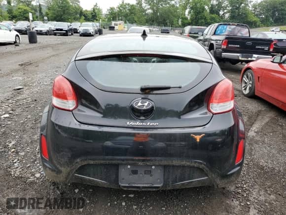 2016 Hyundai Veloster z VIN KMHTC6AD5GU250910, wystawiony jako Copart lot #60926793 z przebiegiem 78 205 mil mil oraz . Historia ofert i sprzedaży dostępna na DreamBid. Obrazek 6.