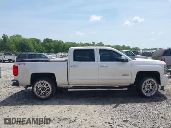 ✅ 2015 Chevrolet Silverado 1500 High Country • VIN: 3GCUKTEJ0FG443056 • Лот: 42172079. Опубликован ранее на IAAI с пробегом 147 797 миль. Бесплатный доступ к архиву аукционных продаж из США и подробный отчёт об истории автомобиля на DreamBid. Изображение 13.