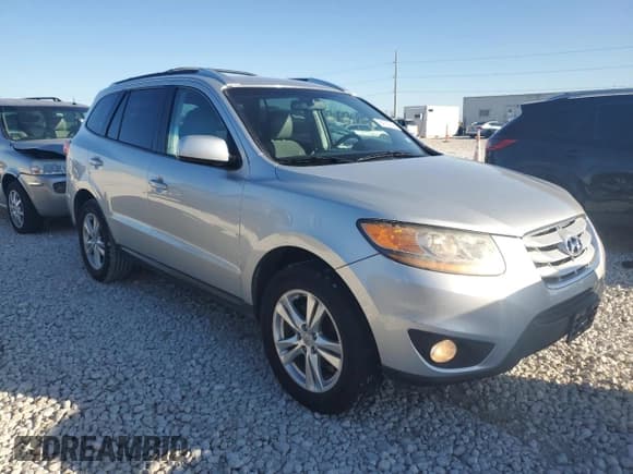 ✅ 2011 Hyundai Santa Fe SE • VIN: 5XYZH4AGXBG042112 • Lot: 84182144. Listed on Copart with 165,055 mi. Free auction sales archive from the USA and detailed vehicle history report at DreamBid. Image 4.