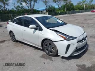 2021 Toyota Prius L Eco with VIN JTDKAMFU4M3149362, listed as a IAAI auction lot 42636584 with 180,786 mi miles and . Bid and sale history available at DreamBid. Image 1.