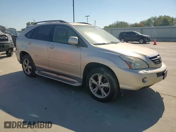 ✅ 2007 Lexus RX 400h • VIN: JTJHW31U272034408 • Lot: 85512025. Wystawiony na Copart z przebiegiem 192 990 mil. Bezpłatny archiwum sprzedaży aukcyjnych z USA i szczegółowy raport historii pojazdu na DreamBid. Zdjęcie 14.