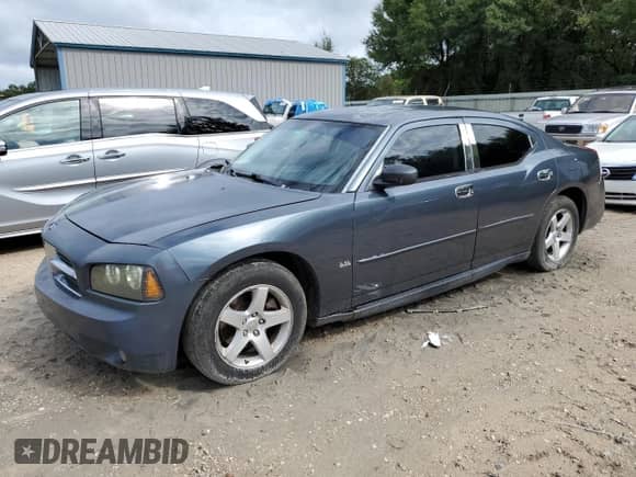 2008 Dodge Charger SXT с VIN 2B3KA33G18H275644, выставлен на аукционе Copart как лот 71127934 с пробегом 163 826 миль миль и Списание • Salvage title. История ставок и продаж доступна на DreamBid. Изображение 1.
