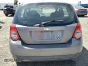 ✅ 2011 Chevrolet Aveo 1LT • VIN: KL1TD6DE3BB148748 • Lot: 52993025. Wystawiony na Copart z przebiegiem 141 814 mil. Bezpłatny archiwum sprzedaży aukcyjnych z USA i szczegółowy raport historii pojazdu na DreamBid. Zdjęcie 7.