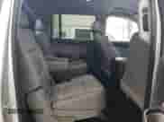 2016 Chevrolet Suburban LT z VIN 1GNSCHKC8GR483322, wystawiony jako Copart lot #70369774 z przebiegiem 130 934 mil mil oraz Szkoda całkowita • Salvage title. Historia ofert i sprzedaży dostępna na DreamBid. Obrazek 11.