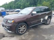 ✅ 2015 Jeep Grand Cherokee Summit • VIN: 1C4RJFJG1FC629969 • Lot: 42707649. Listed on IAAI with 140,850 mi. Free auction sales archive from the USA and detailed vehicle history report at DreamBid. Image 2.