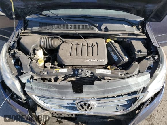 ✅ 2014 Volkswagen Routan SE • VIN: 2C4RVABG7ER134462 • Lot: 76492444. Listed on Copart with 93,373 mi. Free auction sales archive from the USA and detailed vehicle history report at DreamBid. Image 12.