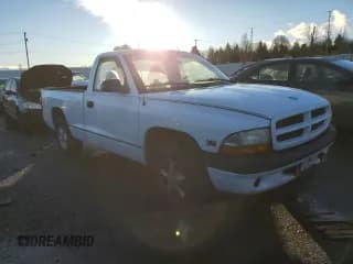 ✅ 1999 Dodge Dakota SLT • VIN: 1B7FL26X6XS142370 • Lot: 84569414. Wystawiony na Copart z przebiegiem 154 902 mil. Bezpłatny archiwum sprzedaży aukcyjnych z USA i szczegółowy raport historii pojazdu na DreamBid. Zdjęcie 4.