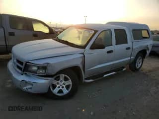 2010 Dodge Dakota Bighorn/Lonestar z VIN 1D7CE3GKXAS145923, wystawiony jako Copart lot #85364874 z przebiegiem 170 312 mil mil oraz Szkoda całkowita • Salvage title. Historia ofert i sprzedaży dostępna na DreamBid. Obrazek 1.