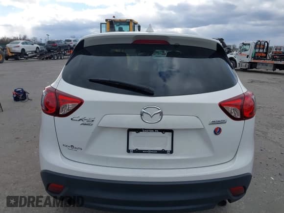 ✅ 2015 Mazda CX-5 Grand Touring • VIN: JM3KE4DY3F0448427 • Лот: 43712387. Опубликован ранее на IAAI с пробегом 131 182 миль. Бесплатный доступ к архиву аукционных продаж из США и подробный отчёт об истории автомобиля на DreamBid. Изображение 16.