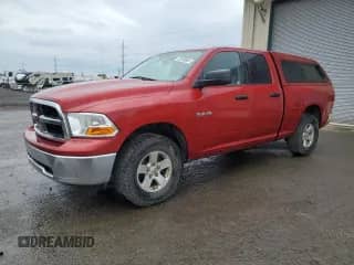 2009 Dodge 1500 SLT с VIN 1D3HV18P49S731020, выставлен на аукционе Copart как лот 84051975 с пробегом 172 029 миль миль и Чистый • Clean title. История ставок и продаж доступна на DreamBid. Изображение 1.