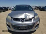 ✅ 2012 Mazda CX-7 i Touring • VIN: JM3ER2C5XC0412632 • Lot: 52569775. Wystawiony na Copart z przebiegiem 225 995 mil. Bezpłatny archiwum sprzedaży aukcyjnych z USA i szczegółowy raport historii pojazdu na DreamBid. Zdjęcie 5.