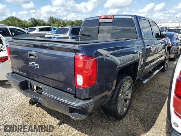 ✅ 2018 Chevrolet Silverado 1500 LTZ • VIN: 3GCUKSECXJG406276 • Лот: 74538784. Опубликован ранее на Copart с пробегом 97 927 миль. Бесплатный доступ к архиву аукционных продаж из США и подробный отчёт об истории автомобиля на DreamBid. Изображение 3.