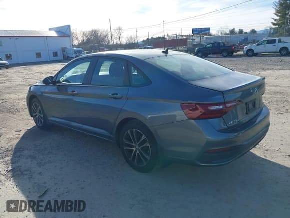 ✅ 2022 Volkswagen Jetta Sport • VIN: 3VWBM7BU1NM023357 • Lot: 38647076. Listed on IAAI with 7,596 mi. Free auction sales archive from the USA and detailed vehicle history report at DreamBid. Image 3.