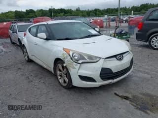 ✅ 2013 Hyundai Veloster w/Black Int • VIN: KMHTC6AD9DU155259 • Lot: 42361365. Wystawiony na IAAI z przebiegiem 261 896 mil. Bezpłatny archiwum sprzedaży aukcyjnych z USA i szczegółowy raport historii pojazdu na DreamBid. Zdjęcie 1.