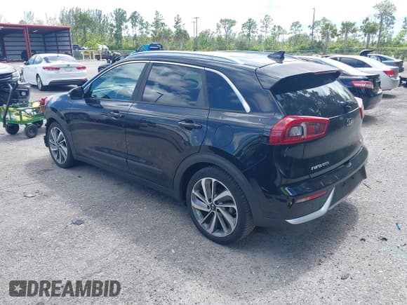 ✅ 2017 Kia Niro Touring • VIN: KNDCE3LC8H5047958 • Lot: 42589635. Listed on IAAI with 139,239 mi. Free auction sales archive from the USA and detailed vehicle history report at DreamBid. Image 3.