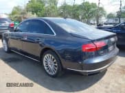 ✅ 2015 Audi A8 • VIN: WAUJGAFD3FN021160 • Lot: 42831661. Listed on IAAI with 170,130 mi. Free auction sales archive from the USA and detailed vehicle history report at DreamBid. Image 3.