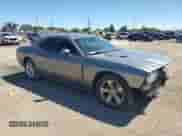 2012 Dodge Challenger SXT z VIN 2C3CDYAG7CH180240, wystawiony jako Copart lot #73298884 z przebiegiem 165 005 mil mil oraz Szkoda całkowita • Salvage title. Historia ofert i sprzedaży dostępna na DreamBid. Obrazek 4.
