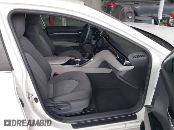 2019 Toyota Camry LE with VIN 4T1B11HK3KU709546, listed as a IAAI auction lot 42836396 with 113,611 mi miles and . Bid and sale history available at DreamBid. Image 5.