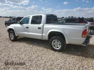 2002 Dodge Dakota Sport z VIN 1B7HG38N02S691280, wystawiony jako Copart lot #66309924 z przebiegiem 227 327 mil mil oraz Czysty tytuł • Clean title. Historia ofert i sprzedaży dostępna na DreamBid. Obrazek 2.