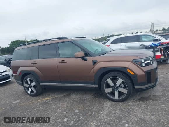 2024 Hyundai Santa Fe Limited z VIN 5NMP44GL6RH027033, wystawiony jako IAAI lot #41365875 z przebiegiem 1 875 mil mil oraz . Historia ofert i sprzedaży dostępna na DreamBid. Obrazek 13.