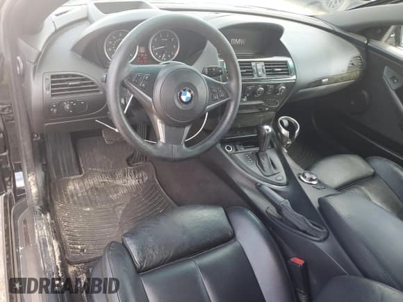 ✅ 2006 BMW 6 Series 650Ci • VIN: WBAEK13416CN78679 • Lot: 71062835. Wystawiony na Copart z przebiegiem 141 716 mil. Bezpłatny archiwum sprzedaży aukcyjnych z USA i szczegółowy raport historii pojazdu na DreamBid. Zdjęcie 8.