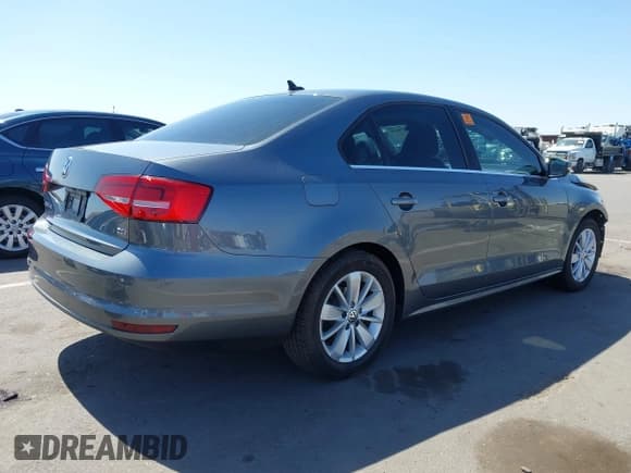 ✅ 2015 Volkswagen Jetta SE • VIN: 3VWD17AJ6FM406091 • Lot: 42539626. Listed on IAAI with 82,005 mi. Free auction sales archive from the USA and detailed vehicle history report at DreamBid. Image 4.