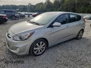 2012 Hyundai Accent SE with VIN KMHCU5AE0CU023330, listed as a Copart auction lot 82061385 with 112,872 mi miles and Salvage title. Bid and sale history available at DreamBid. Image 1.