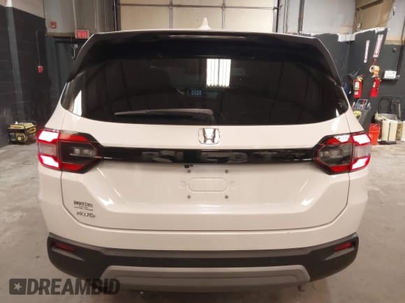 ✅ 2023 Honda Pilot EX-L • VIN: 5FNYG1H5XPB043275 • Лот: 41747522. Опубликован ранее на IAAI с пробегом 18 865 миль. Бесплатный доступ к архиву аукционных продаж из США и подробный отчёт об истории автомобиля на DreamBid. Изображение 16.