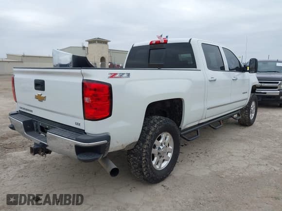 ✅ 2015 Chevrolet Silverado 2500HD LTZ • VIN: 1GC1KWE89FF149299 • Lot: 41565330. Listed on IAAI with 249,551 mi. Free auction sales archive from the USA and detailed vehicle history report at DreamBid. Image 4.