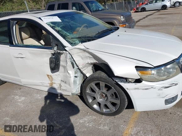 ✅ 2009 Lincoln MKZ • VIN: 3LNHM26T09R622322 • Lot: 43507118. Wystawiony na IAAI z przebiegiem 189 858 mil. Bezpłatny archiwum sprzedaży aukcyjnych z USA i szczegółowy raport historii pojazdu na DreamBid. Zdjęcie 6.