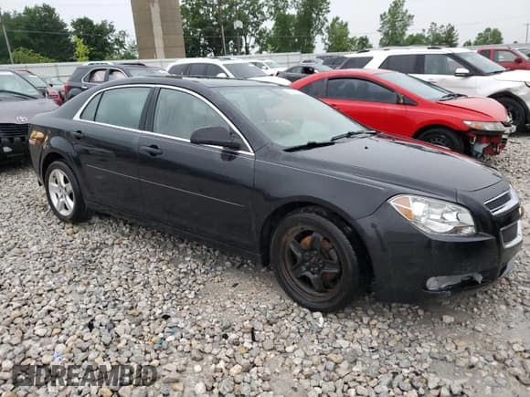 ✅ 2012 Chevrolet Malibu 1LS • VIN: 1G1ZB5E04CF164837 • Lot: 60272814. Listed on Copart with 179,951 mi. Free auction sales archive from the USA and detailed vehicle history report at DreamBid. Image 4.