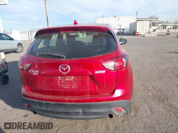✅ 2015 Mazda CX-5 Sport • VIN: JM3KE4BY7F0496421 • Lot: 43872102. Listed on IAAI with 119,348 mi. Free auction sales archive from the USA and detailed vehicle history report at DreamBid. Image 16.