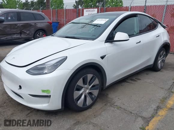 ✅ 2023 Tesla Model Y Long Range • VIN: 7SAYGAEE9PF702910 • Lot: 42199519. Wystawiony na IAAI z przebiegiem 91 094 mil. Bezpłatny archiwum sprzedaży aukcyjnych z USA i szczegółowy raport historii pojazdu na DreamBid. Zdjęcie 2.
