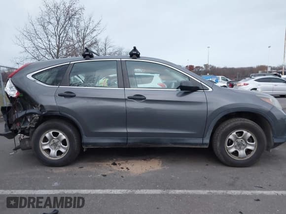 ✅ 2014 Honda CR-V LX • VIN: 2HKRM4H36EH707275 • Лот: 43689129. Опубликован ранее на IAAI с пробегом 117 700 миль. Бесплатный доступ к архиву аукционных продаж из США и подробный отчёт об истории автомобиля на DreamBid. Изображение 13.
