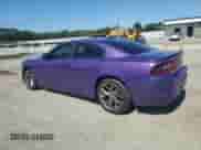 2016 Dodge Charger SXT with VIN 2C3CDXHG4GH147007, listed as a Copart auction lot 84938275 with 124,265 mi miles and Salvage title. Bid and sale history available at DreamBid. Image 2.