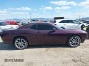 ✅ 2022 Dodge Challenger SXT • VIN: 2C3CDZGG7NH234412 • Lot: 42116869. Listed on IAAI with 61,853 mi. Free auction sales archive from the USA and detailed vehicle history report at DreamBid. Image 14.