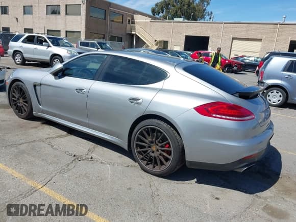 ✅ 2016 Porsche Panamera 4 • VIN: WP0AA2A7XGL005997 • Лот: 42671984. Опубликован ранее на IAAI с пробегом 95 983 миль. Бесплатный доступ к архиву аукционных продаж из США и подробный отчёт об истории автомобиля на DreamBid. Изображение 3.