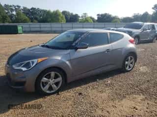 2015 Hyundai Veloster z VIN KMHTC6AD6FU227456, wystawiony jako Copart lot #66915114 z przebiegiem 83 266 mil mil oraz Szkoda całkowita • Salvage title. Historia ofert i sprzedaży dostępna na DreamBid. Obrazek 1.