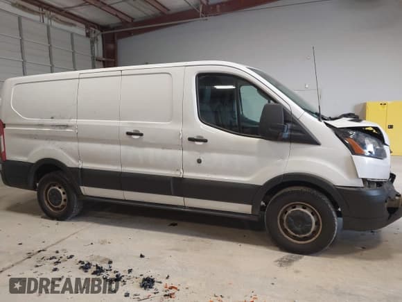 ✅ 2019 Ford Transit • VIN: 1FTYE1ZM4KKB38454 • Lot: 41599919. Listed on IAAI with 187,153 mi. Free auction sales archive from the USA and detailed vehicle history report at DreamBid. Image 13.