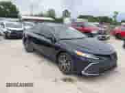 2022 Toyota Camry Hybrid XLE with VIN 4T1F31AK4NU591517, listed as a IAAI auction lot 42216959 with 36,048 mi miles and . Bid and sale history available at DreamBid. Image 1.