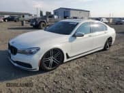 ✅ 2016 BMW 7 Series 740i • VIN: WBA7E2C52GG547305 • Лот: 80148255. Опубликован ранее на Copart с пробегом 99 952 миль. Бесплатный доступ к архиву аукционных продаж из США и подробный отчёт об истории автомобиля на DreamBid. Изображение 1.