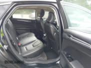 ✅ 2015 Ford Fusion Titanium • VIN: 3FA6P0D97FR246928 • Lot: 42601519. Listed on IAAI with 199,302 mi. Free auction sales archive from the USA and detailed vehicle history report at DreamBid. Image 8.