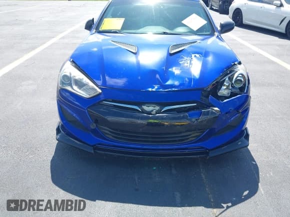 ✅ 2013 Hyundai Genesis Coupe 2.0T • VIN: KMHHT6KD1DU090198 • Lot: 42297169. Wystawiony na IAAI z przebiegiem 69 501 mil. Bezpłatny archiwum sprzedaży aukcyjnych z USA i szczegółowy raport historii pojazdu na DreamBid. Zdjęcie 6.