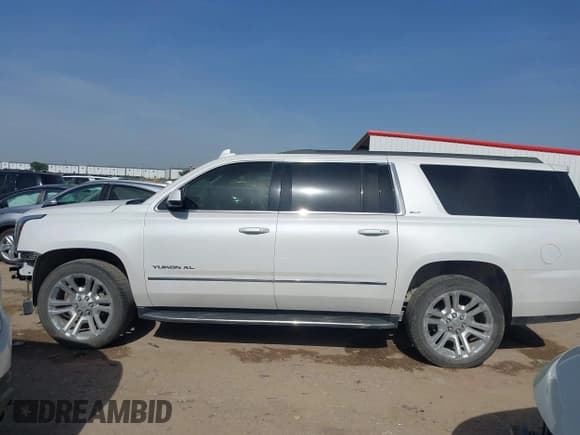 ✅ 2017 GMC Yukon XL SLT • VIN: 1GKS1GKCXHR135519 • Lot: 42244028. Listed on IAAI with 185,686 mi. Free auction sales archive from the USA and detailed vehicle history report at DreamBid. Image 15.