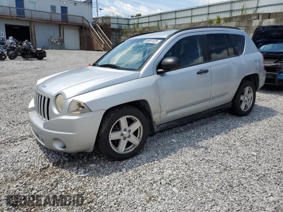 ✅ 2008 Jeep Compass Sport • VIN: 1J8FT47W18D735151 • Lot: 80169025. Listed on Copart with 214,904 mi. Free auction sales archive from the USA and detailed vehicle history report at DreamBid. Image 1.