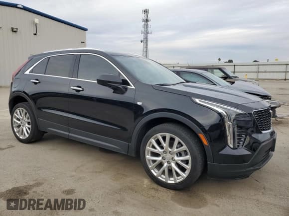 ✅ 2022 Cadillac XT4 FWD Luxury • VIN: 1GYAZAR42NF120533 • Lot: 43794025. Listed on Copart with 54,862 mi. Free auction sales archive from the USA and detailed vehicle history report at DreamBid. Image 4.