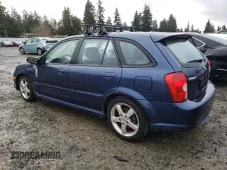 ✅ 2003 Mazda Protege • VIN: JM1BJ246831154986 • Lot: 86130544. Wystawiony na Copart z przebiegiem 277 837 mil. Bezpłatny archiwum sprzedaży aukcyjnych z USA i szczegółowy raport historii pojazdu na DreamBid. Zdjęcie 2.