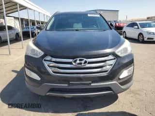 2014 Hyundai Santa Fe z VIN 5XYZUDLA6EG225077, wystawiony jako Copart lot #65020565 z przebiegiem 166 511 mil mil oraz Czysty tytuł • Clean title. Historia ofert i sprzedaży dostępna na DreamBid. Obrazek 5.