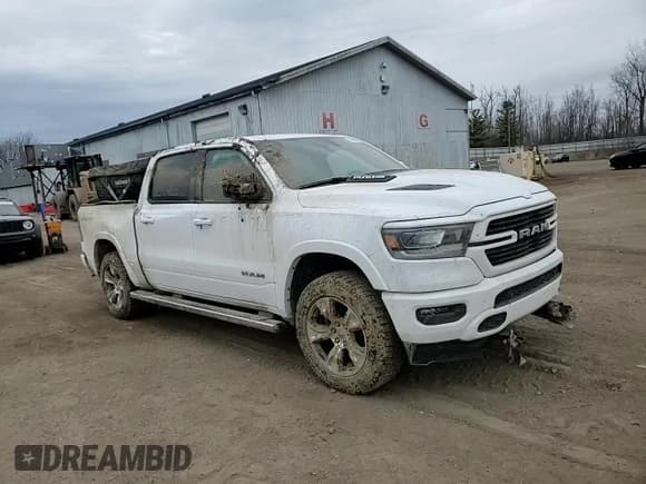 ✅ 2022 Ram 1500 Laramie • VIN: 1C6SRFJM2NN240395 • Лот: 50990235. Опубликован ранее на Copart с пробегом 61 581 миль. Бесплатный доступ к архиву аукционных продаж из США и подробный отчёт об истории автомобиля на DreamBid. Изображение 11.